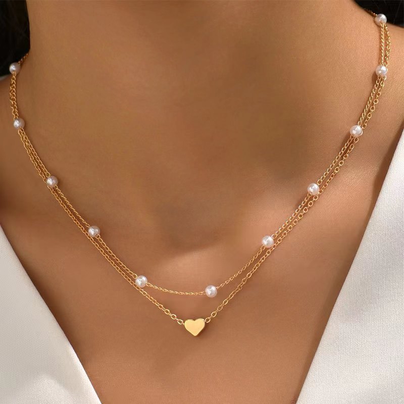 Twin Pearl Herz-Halskette – Doppellagige Eleganz in Gold
