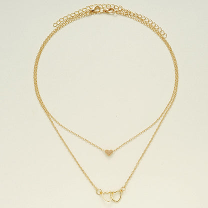 Doppelte Herzkette – Elegantes Design in Gold
